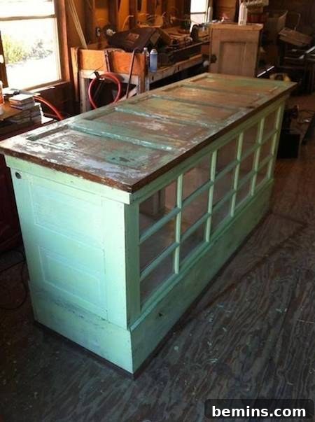 Kitchen island constructed from reclaimed doors