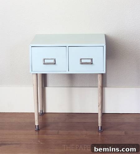 Metal filing cabinet repurposed as a side table