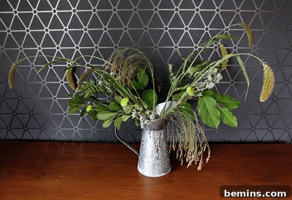Adding filler flowers to the bouquet for added color and texture.
