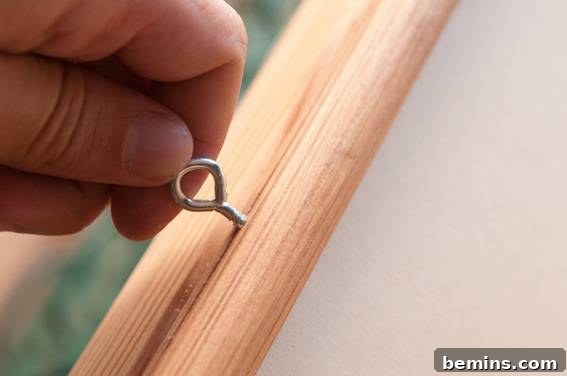 Crafting a Rustic Display: DIY Pull-Down Map Frame for Art 11 Screw in the eye hook