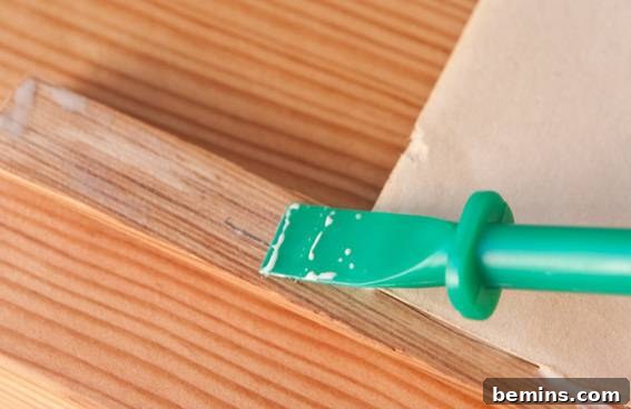 Crafting a Retro-Inspired Display: DIY Pull-Down Map Frame 8 Glue the molding together for poster frame