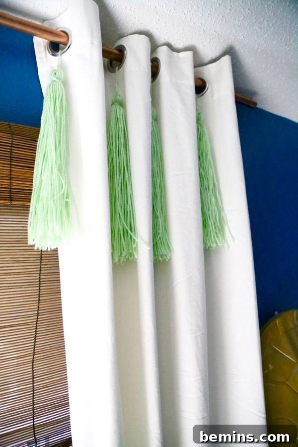Curtains embellished with yarn tassels