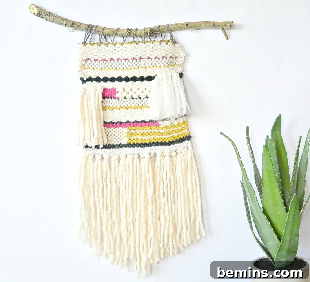 Woven wall hanging created using yarn scraps