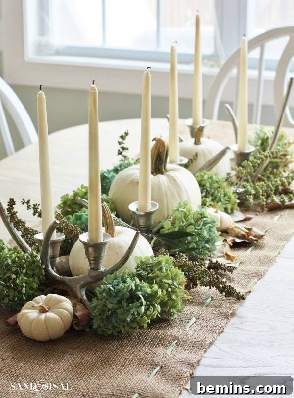 Stunning Autumn Table Decor Ideas 12 Muted greens and whites on a rustic burlap table runner for a fall tablescape.