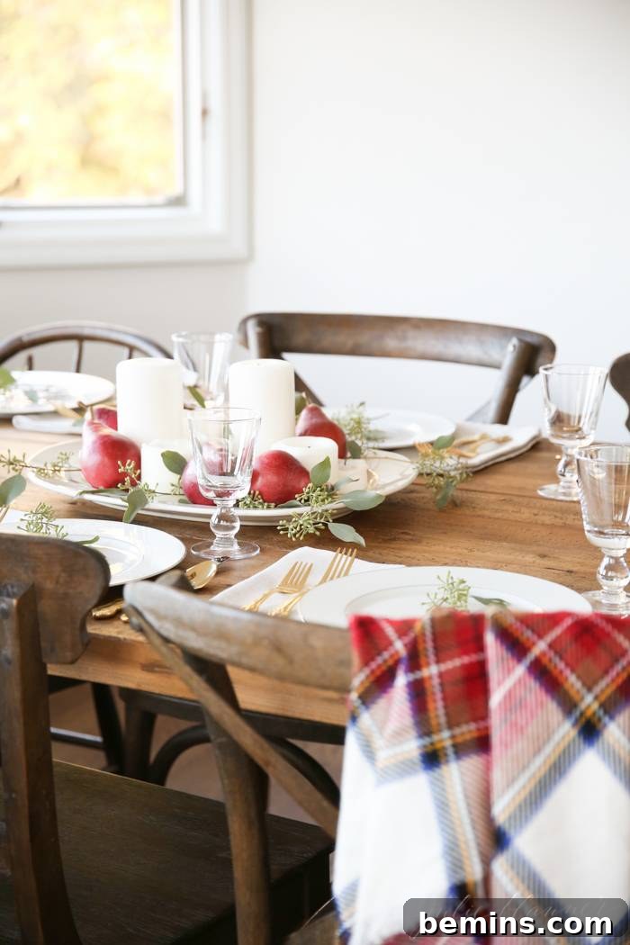 Stunning Autumn Table Decor Ideas 7 A simple and elegant last-minute centerpiece with pillar candles and red pears.