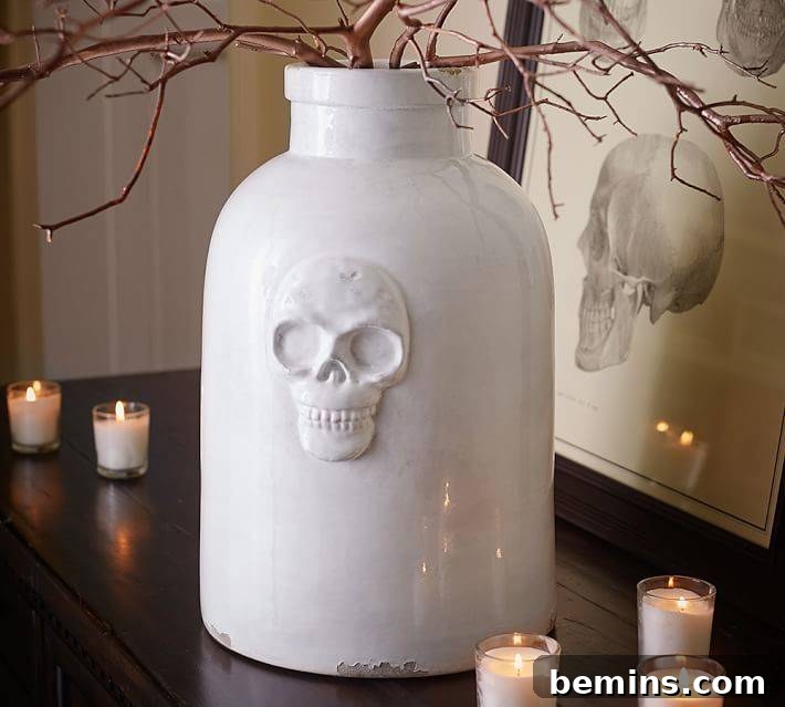 Chicly Spooky: Black & White Halloween Decor 8 Skull Ceramic Vase - Pottery Barn