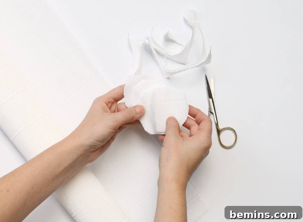 Cutting Petal Shapes from Folded Crepe Paper
