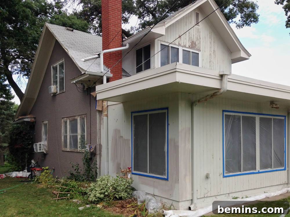 Home painting progress - poised taupe: A slightly updated look, showcasing the initial stages of the paint job.