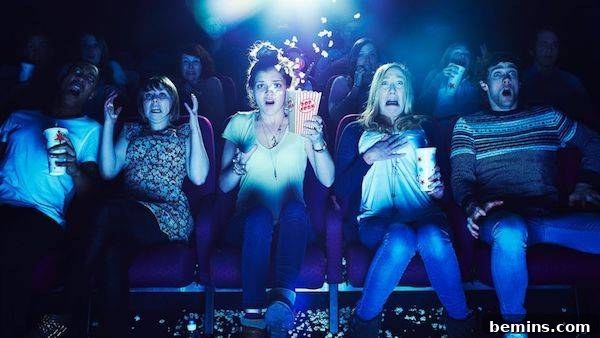 People watching a scary movie
