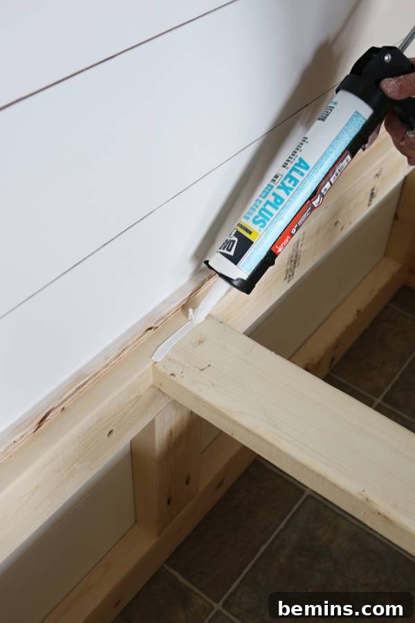 Creating a Stylish Storage Bench: A DIY Guide 17 Caulking Seams and Nail Holes