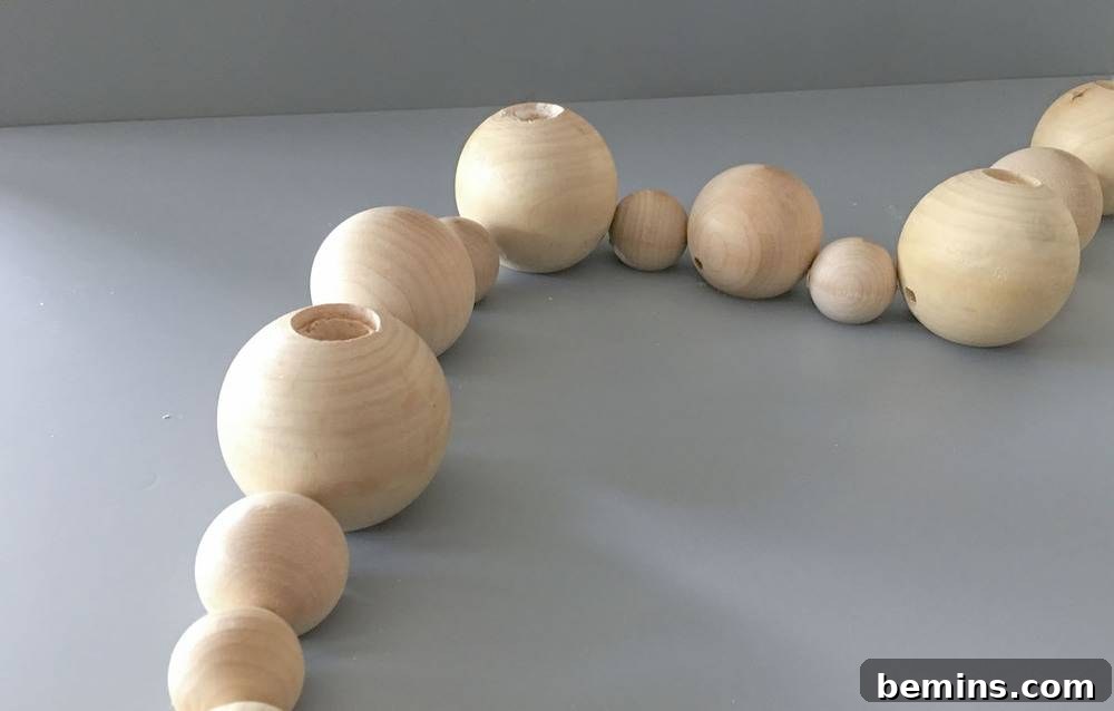 Re-laying Out Wooden Beads in Final Order Before Stringing