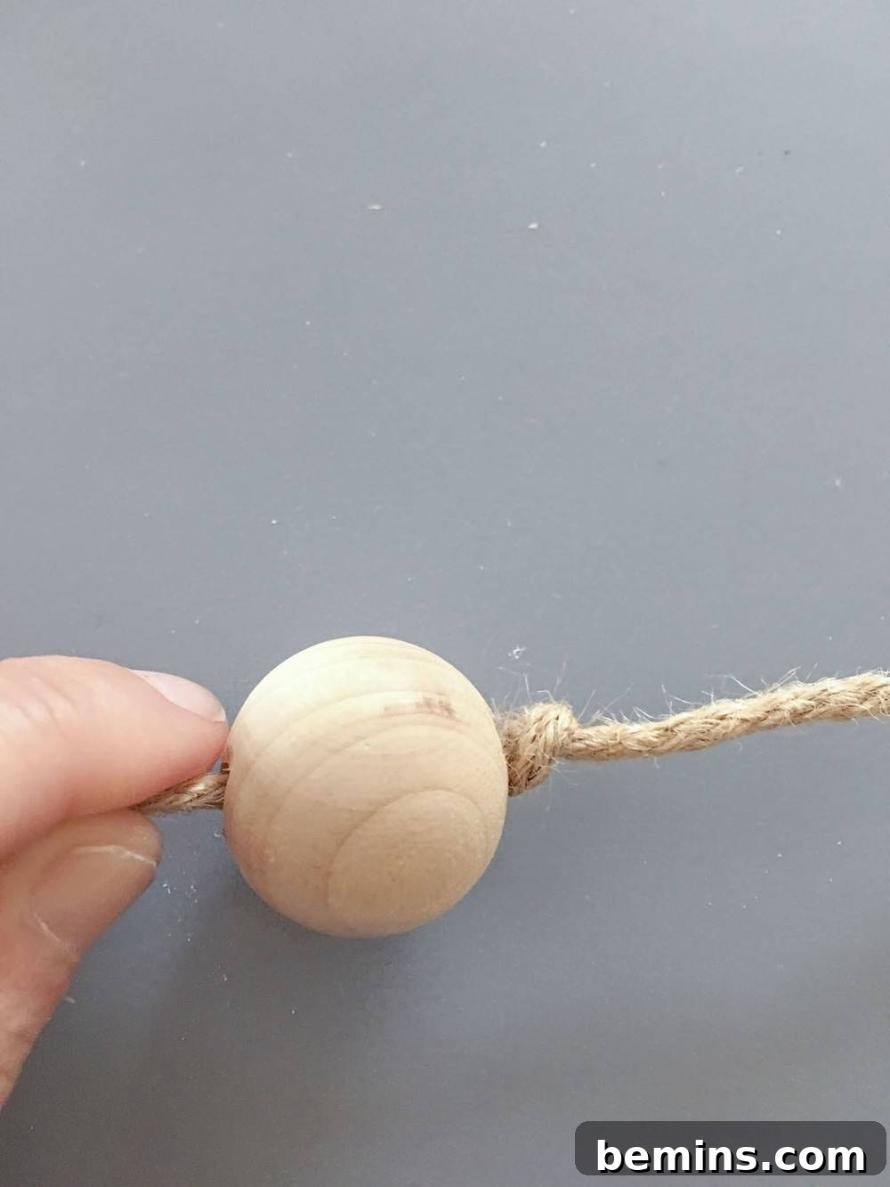 Stringing Wooden Beads onto Jute Twine