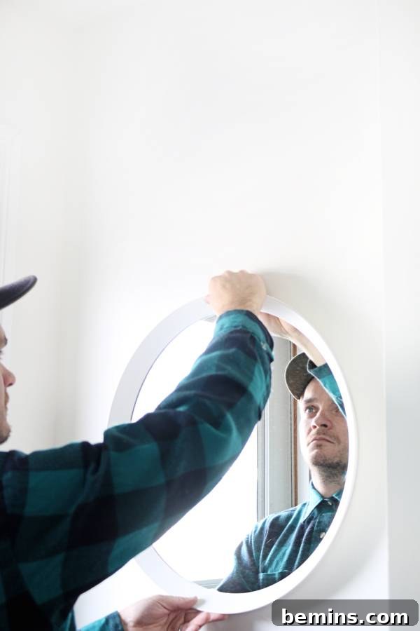 Smart Storage Solutions: An Effortless Mudroom Makeover 9 Round Mirror in Mudroom