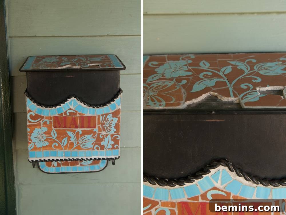 Damaged orange and white material on a black mailbox.