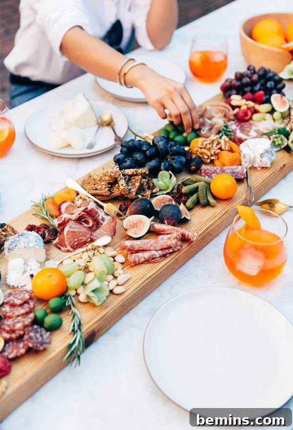 10 Creative & Unique Thanksgiving Tablescapes To Inspire Your Holiday Inspiring Thanksgiving Table Settings: 10 Unique & Creative Ideas 8 Thanksgiving Tablescape with a Charcuterie Board Centerpiece