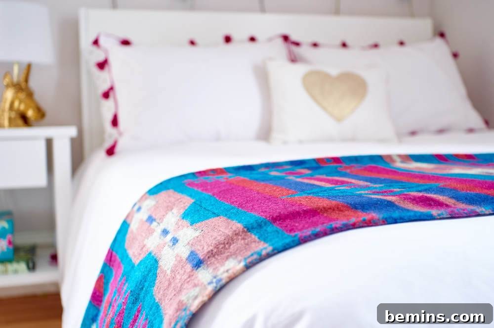 A Whimsical Retreat: Designing a Dream Bedroom for Our Daughter 9 A beautifully styled bed in Ayla's room, showcasing a cohesive blend of colors, textures, and decorative pillows.