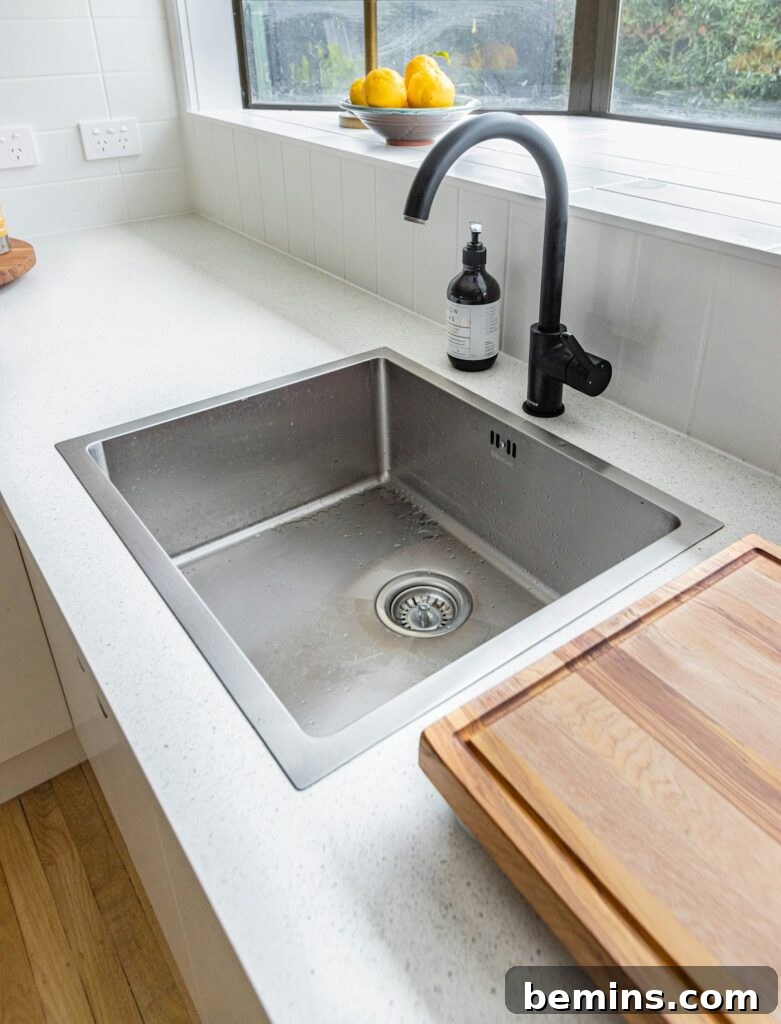 Stainless steel sink with faucet