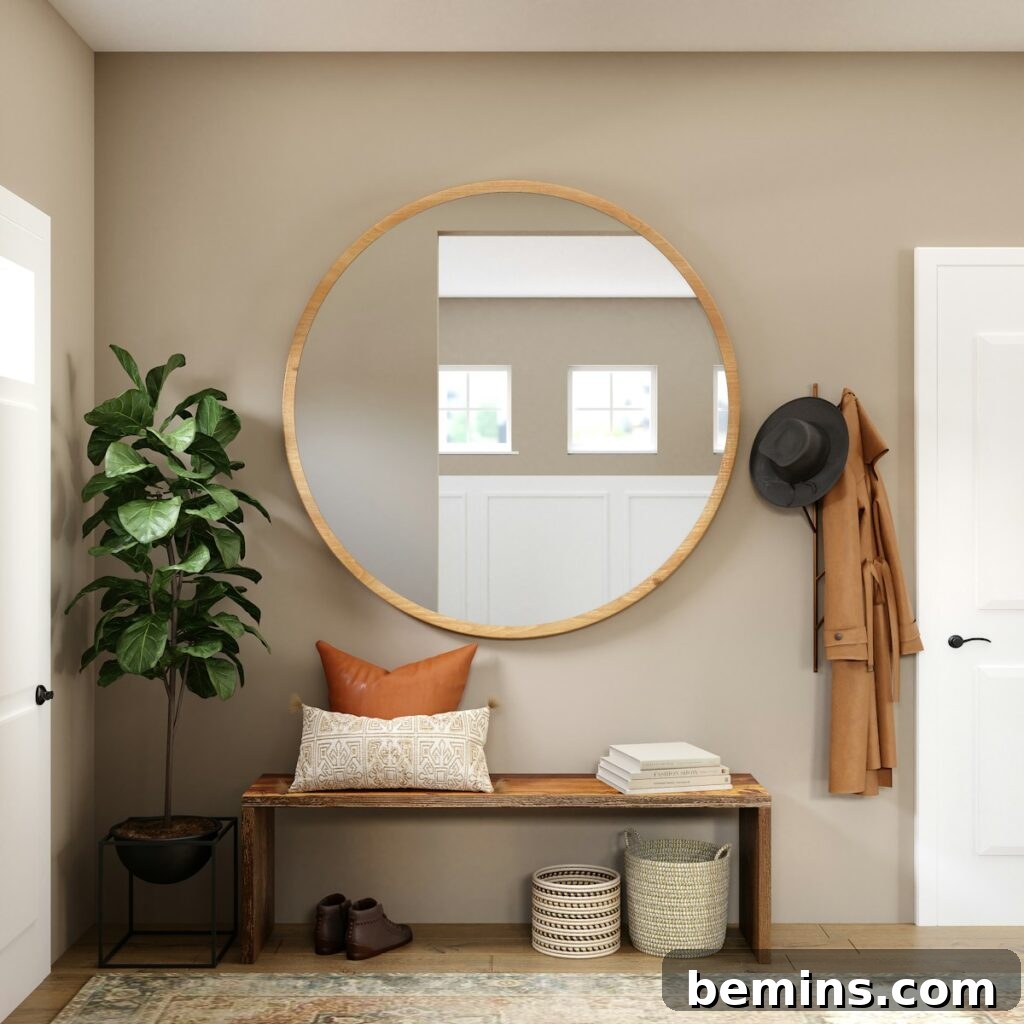 Brown wooden framed mirror on white wall